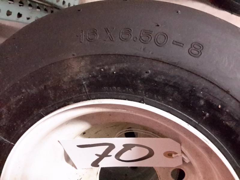 lot 70 image: 4, 16in x 6.5 in x 8 in Tires with rims as shown