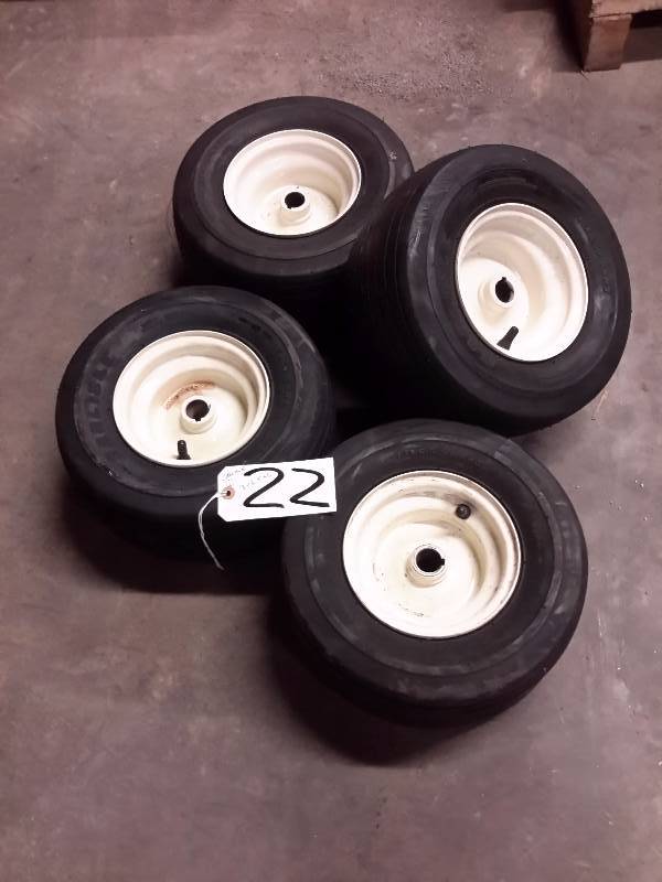 lot 22 image: 4, Carlisle, 13in x 6.5in x 6in.. With Rims