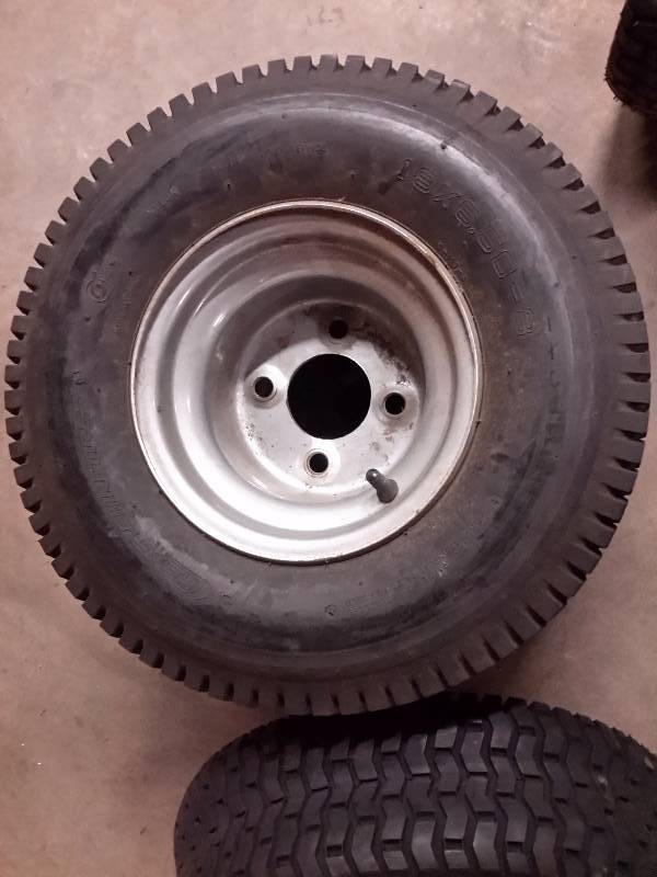 lot 26 image: 2 Brand New, Carlisle, 13in x 6.50 in x 6in tires with rims