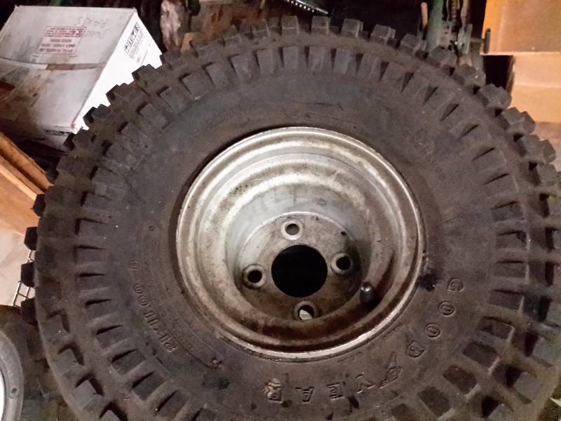 lot 29 image: 2, 21in x 11in x 8in with rims.. KNOBBY type... Both BRAND NEW