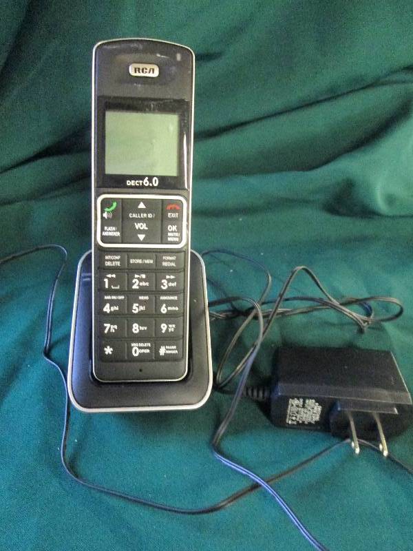 RCA Handheld unit with base charger...