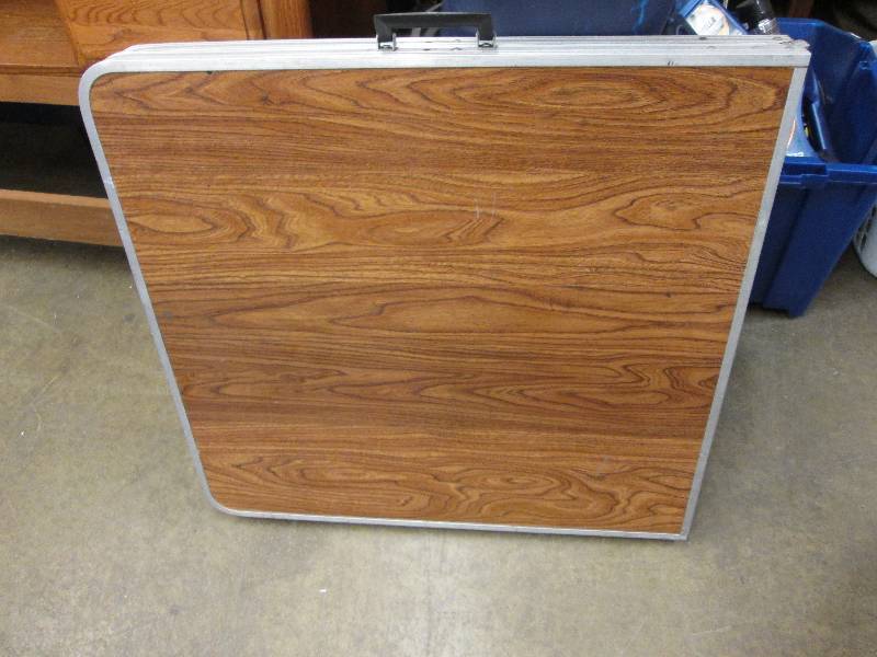 Portable Wood Colored Folding Table...