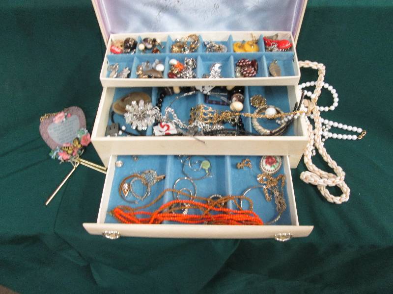 3 Tier Jewelry Box with a large num...