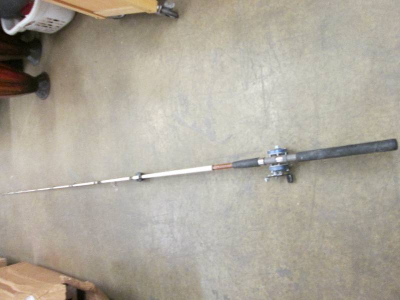 8 ft Ugly Stic with reel fishing ro...