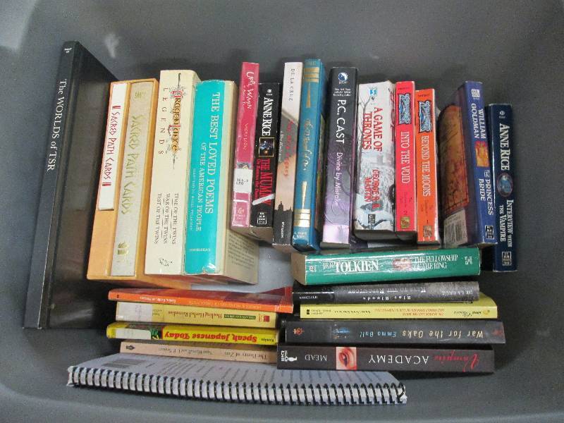 Covered tote filled with hardbound ...
