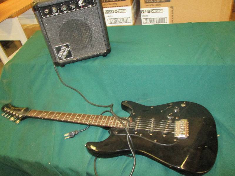 Electric Guitar with Amp...