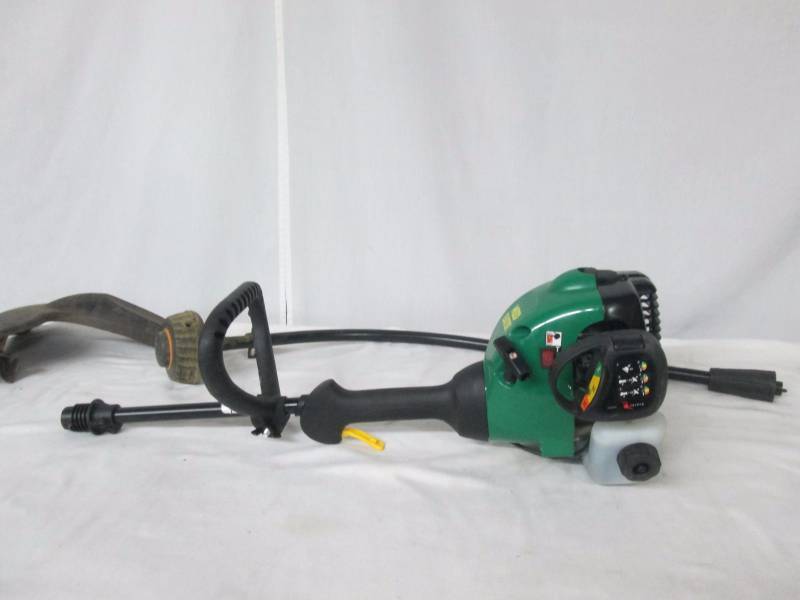 lot 22 image: Weed Eater 16 Curved Shaft 2-Cycle Gas-Powered Grass Trimmer