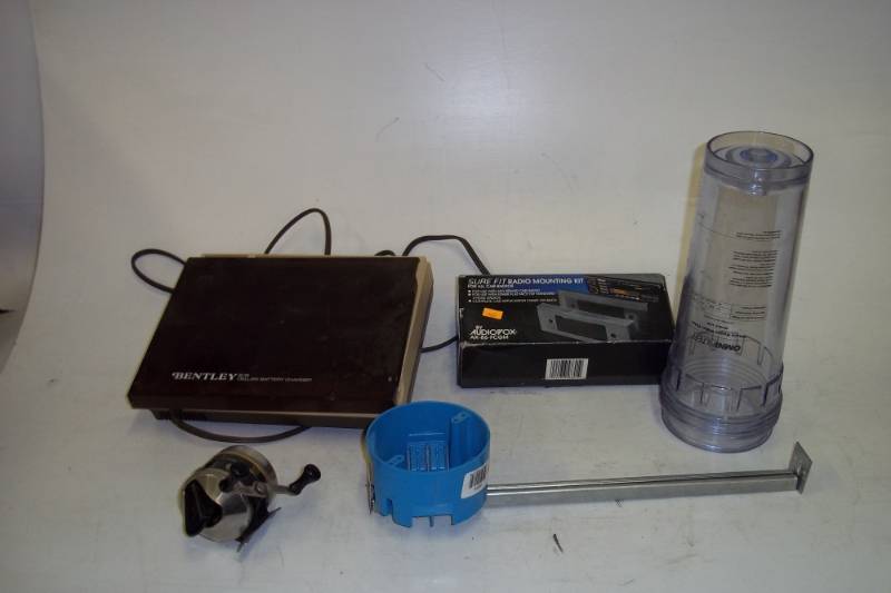 lot 40 image: Lot with battery charger, radio mounting kit, Reel, electrical box and filter housing