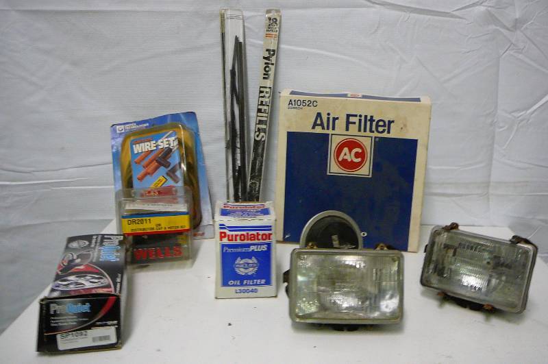 Lot of GM Parts Distributor Cup  Oil Filter  Brake Pads  Air Filter Plug wires Wiper Blades