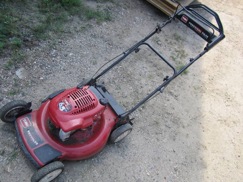 lot 9 image: Toro 6.5 HP push mower, runs well, ...