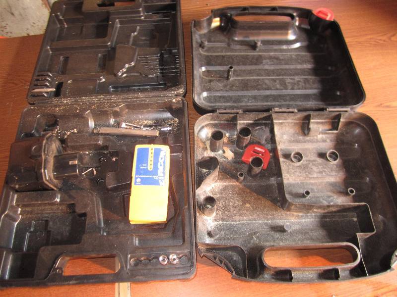 lot 100 image: 2 cases, battery and stud finder...