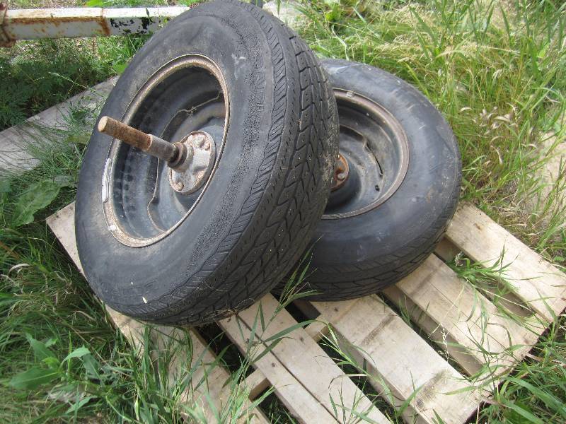 lot 105 image: Pair of tires for pulling shore sta...