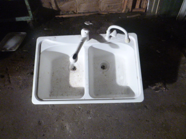White Sink with Faucet