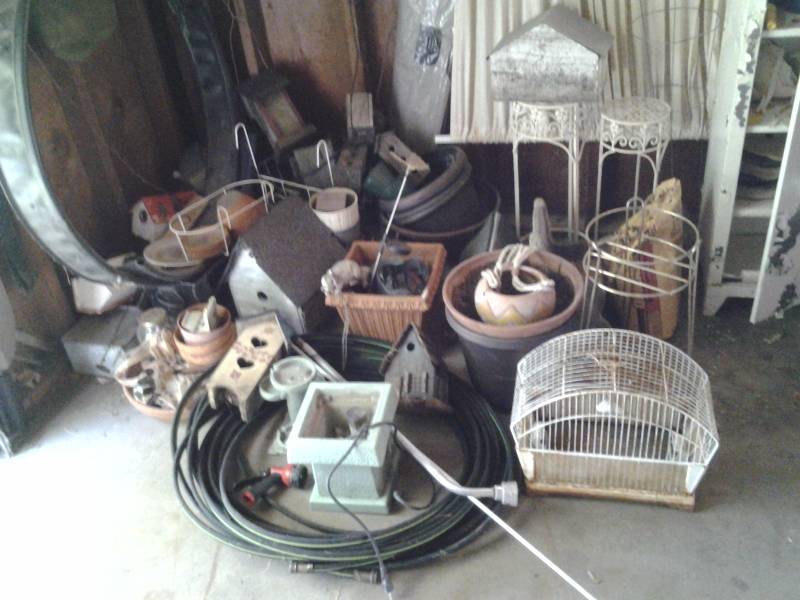 lot 59 image: Large Lot Of Yard Decor  Bird Houses, Hoses, Planters, Stands, More
