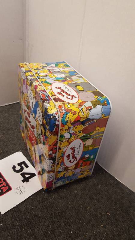 lot 54 image: Simpsons Triva Game Tin Case