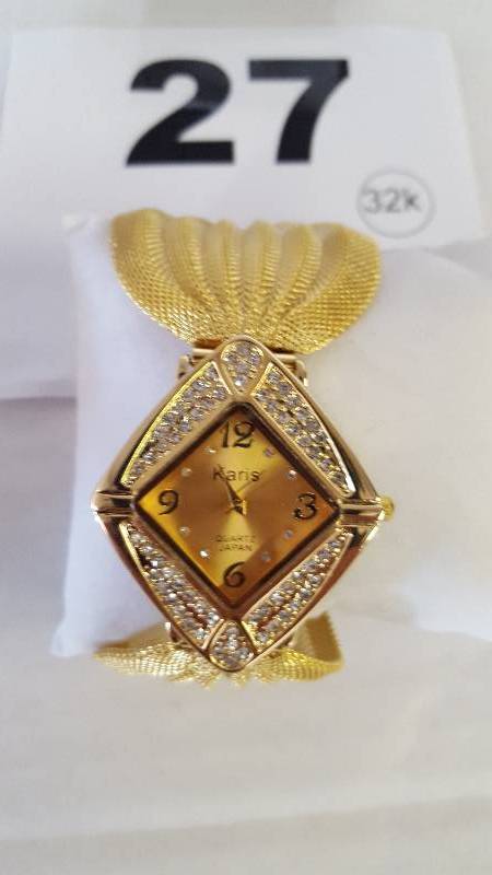 lot 27 image: Ladies Gold Mesh Band Watch