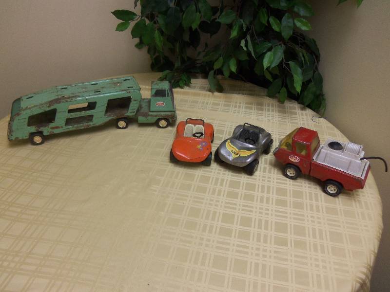 Four Metal Tonka Toys