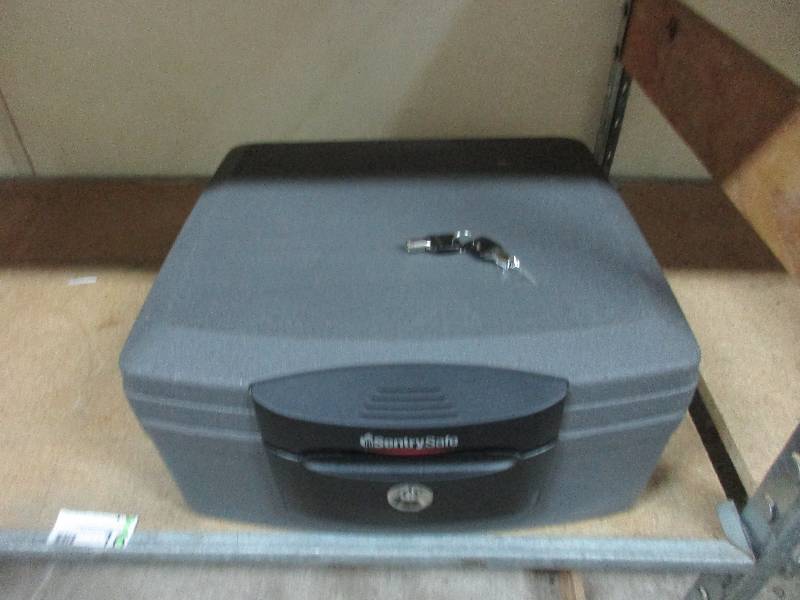16. SentrySafe keyed entry fire and waterproof safe for storing important documents.
