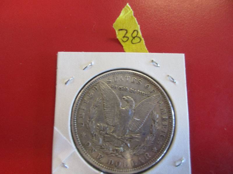 38. 1884 P Morgan Silver Dollar