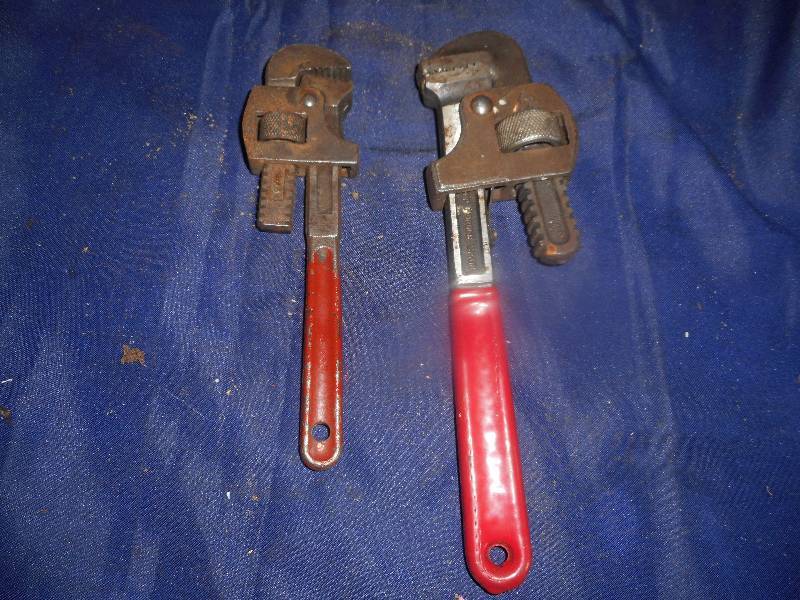 2 small pipe wrenches