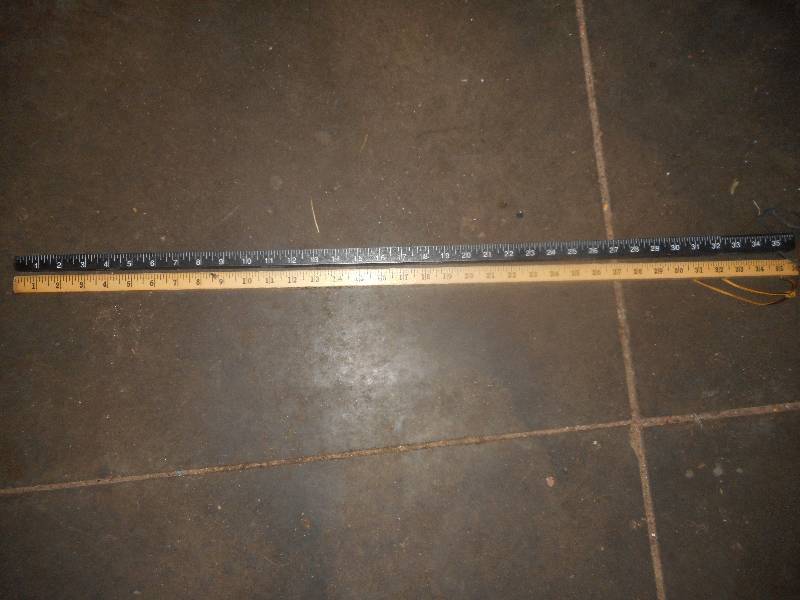 2 wooden yard sticks