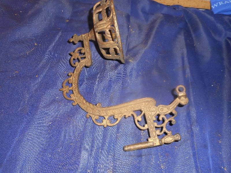 antique cast iron candle holder