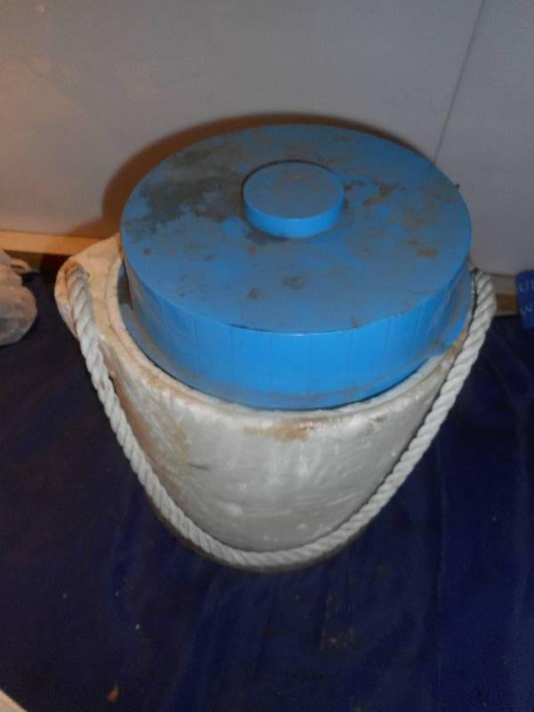 vintage water thermos and styraphome cooler