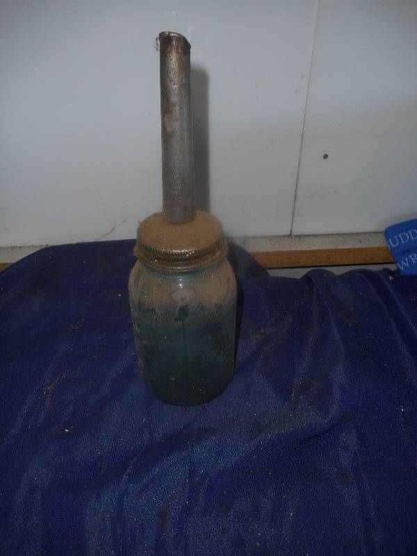 ANTIQUE OIL SPOUT AND JAR