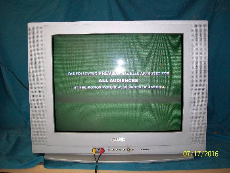 lot 16 image: 24 Sanyo Color Television with Remote.