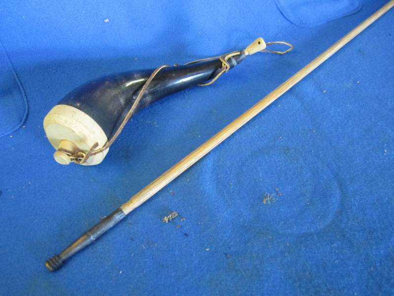lot 16 image: Powder horn with gun ram rod...