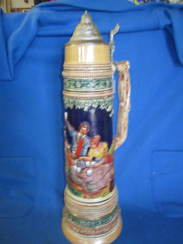 lot 9 image: 24 tall German beer stien in good ...