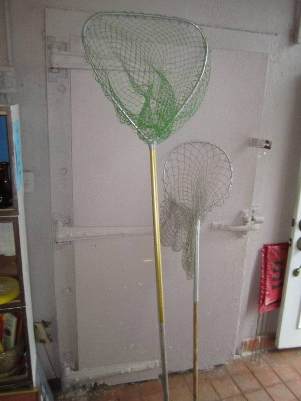 lot 21 image: 2 fishing nets, one has extended po...