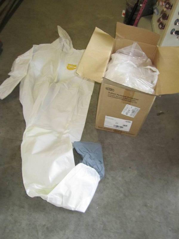 lot 47 image: Box of DuPont nextshield coveralls...