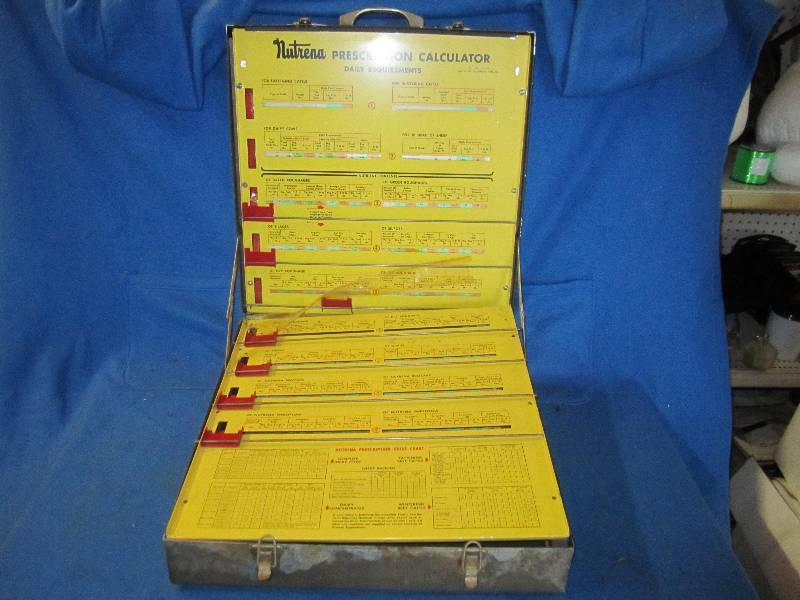 lot 37 image: Vintage Nutrena prescription calcul...