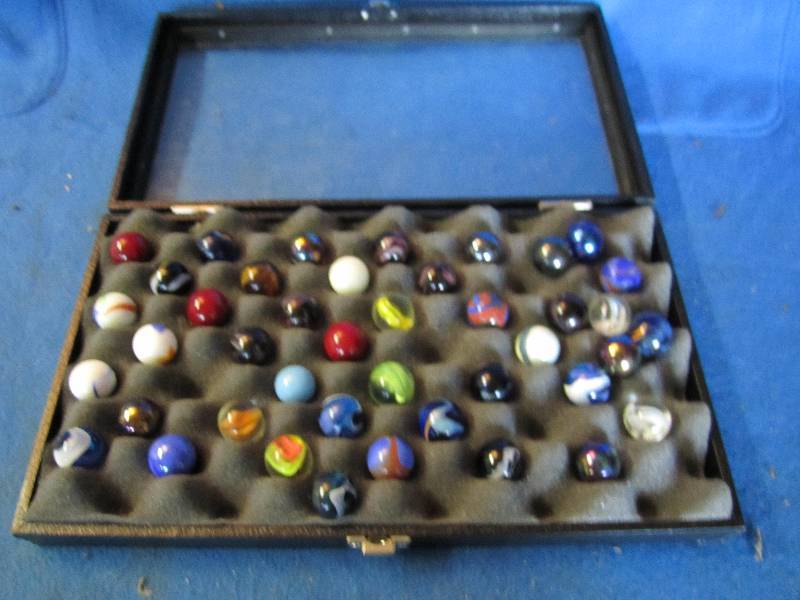 lot 71 image: Display case of large marbles...