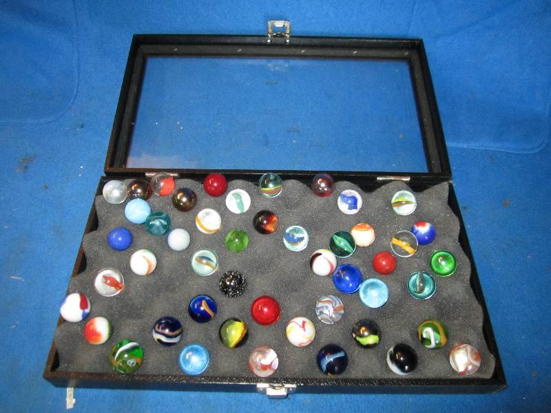 lot 72 image: Display case of large marbles...