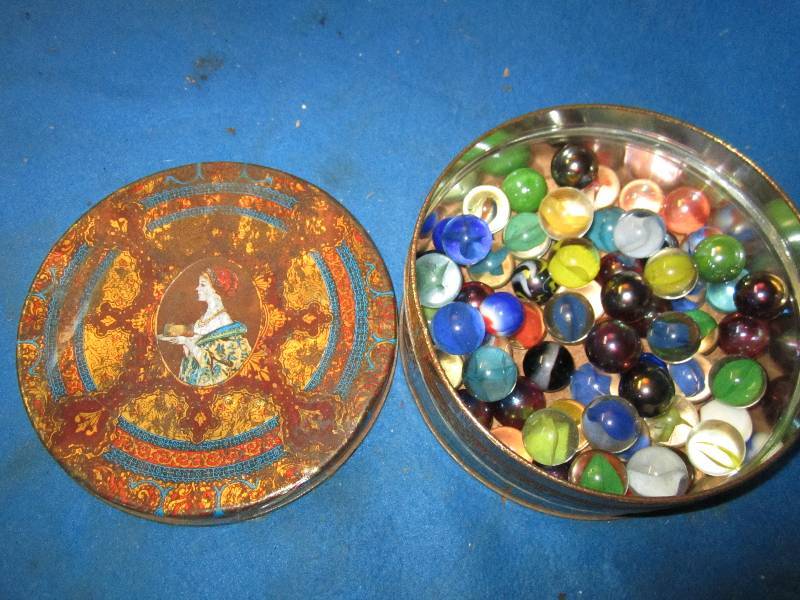 lot 74 image: Vintage tin of large marbles...