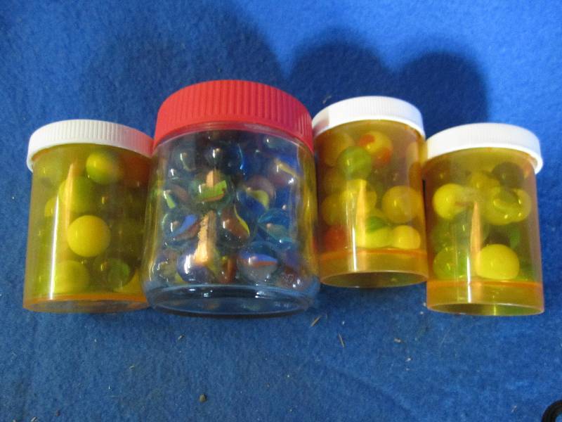lot 76 image: 3 jars of marbles...