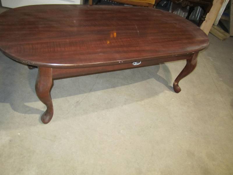 lot 105 image: Wood coffee table...
