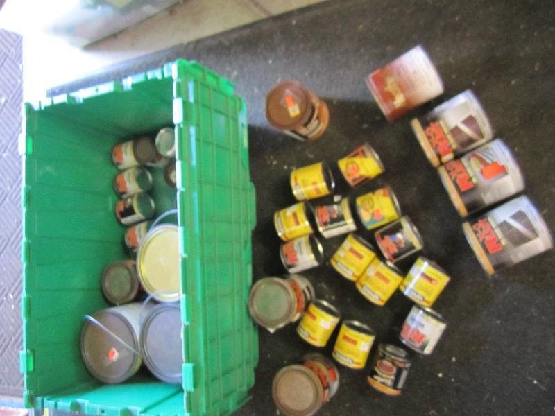 lot 117 image: lots of cans of primer and wood fin...