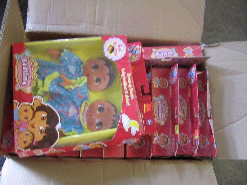 lot 124 image: Box of dora bed time outfits new in...