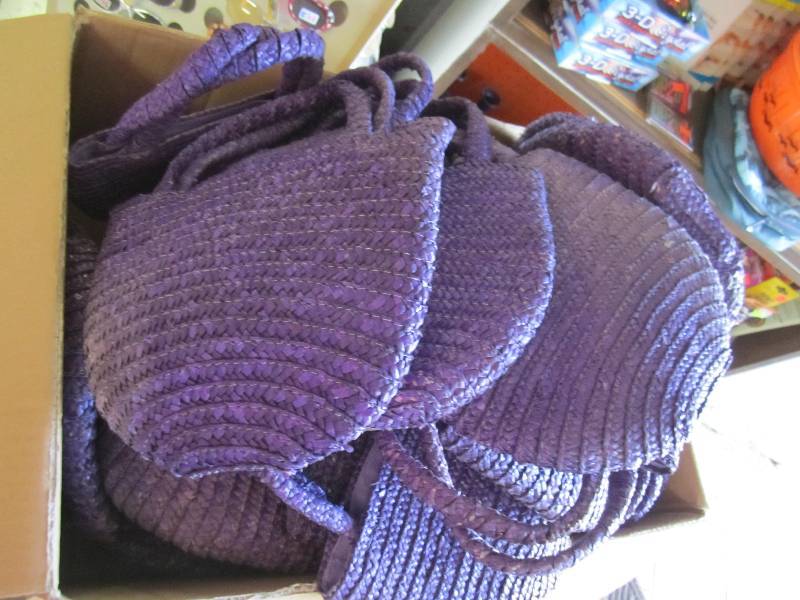 lot 128 image: big box of purple purses...