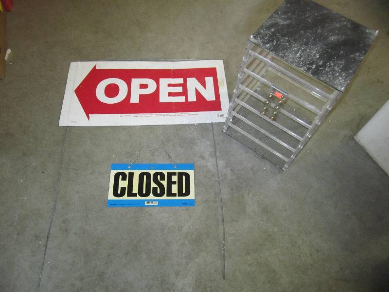 lot 130 image: open and close signs and jewelry ra...