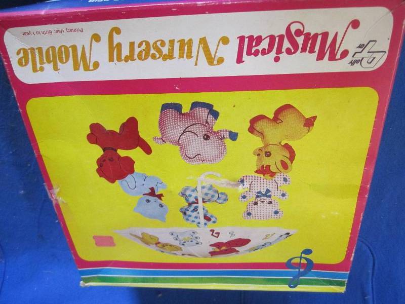 lot 145 image: Musical nursery mobile...