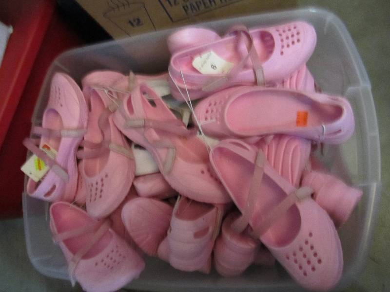 lot 146 image: Bin of garden shoes mostly pink som...