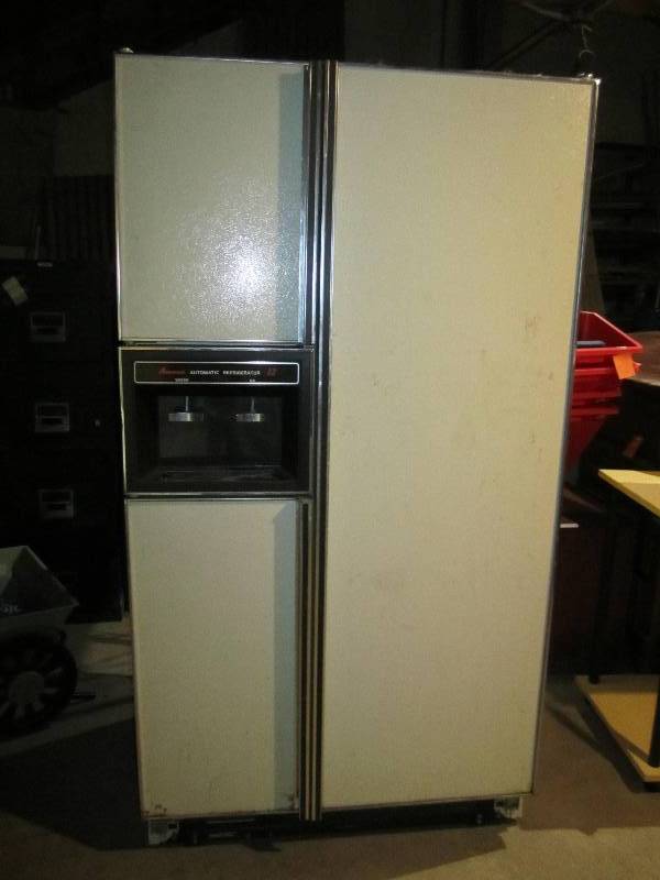 lot 188 image: Amana side by side refrigerator and...