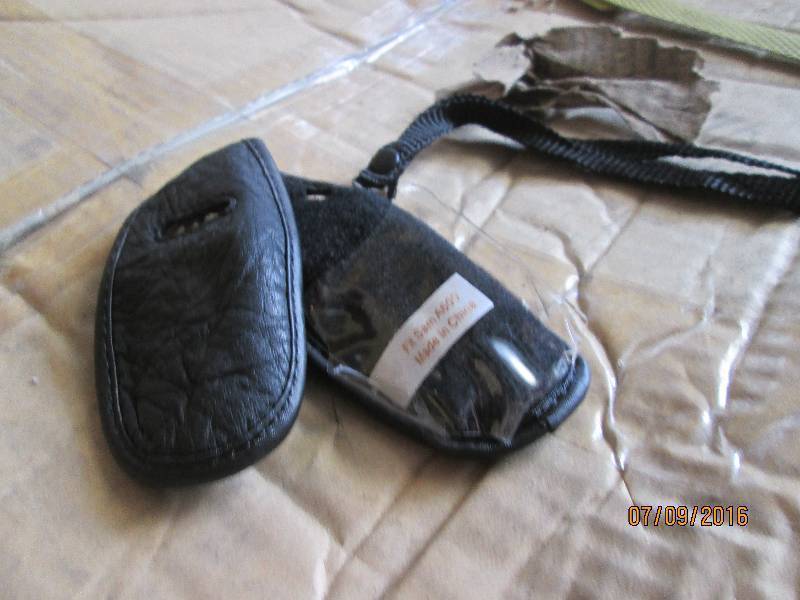 lot 324 image: 9 cases of cell phone holders...