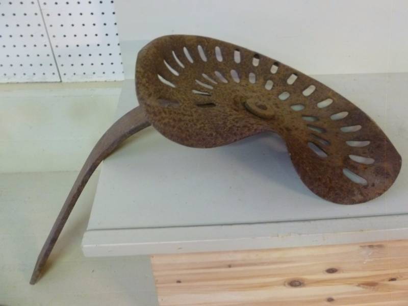 lot 14 image: Antique Tractor Seat