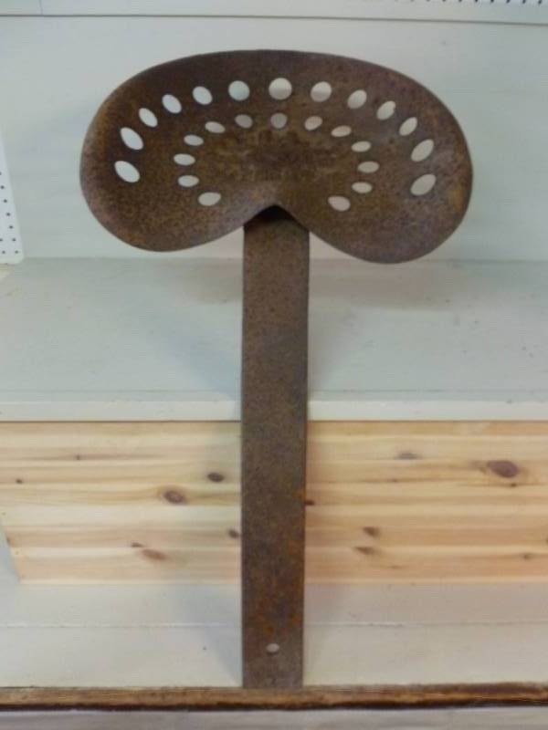 lot 15 image: Antique Tractor Seat