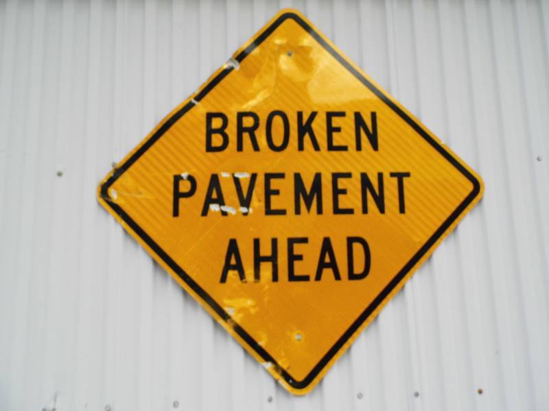 lot 310 image: Broken Pavement Sign